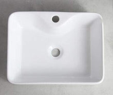 1 lavabo in ceramica rettangolare 48 x 37 cm.