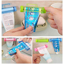 Ruiqas - Spremiagrumi per dentifricio, da appendere, dispenser per dentifricio e dentifricio, con supporto a ventosa