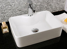1 lavabo in ceramica rettangolare 48 x 37 cm.
