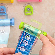 Ruiqas - Spremiagrumi per dentifricio, da appendere, dispenser per dentifricio e dentifricio, con supporto a ventosa