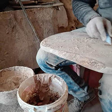 Portabottiglie a forma di luna.